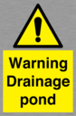 warning-drainage-pond~